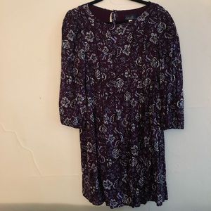 Fun patterned long-sleeve fit and flare dress.